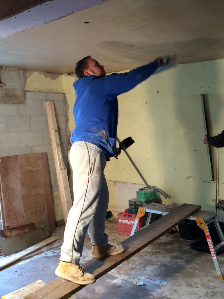 Sitting room ceiling being plastered